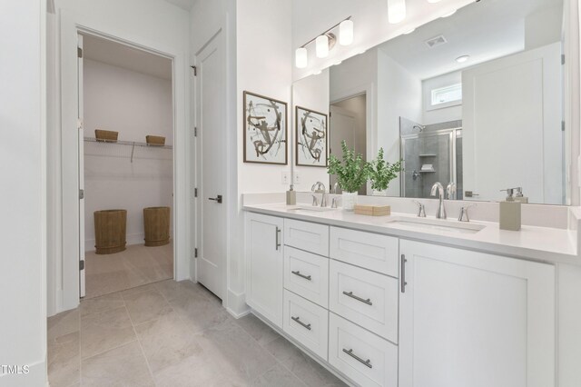 632 Gainer Dr # 19, Raleigh, NC 27610 - full bath with a stall shower, double vanity, and a walk in closet