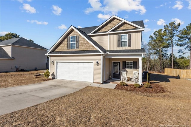 craftsman-style house with a garage and covered porch