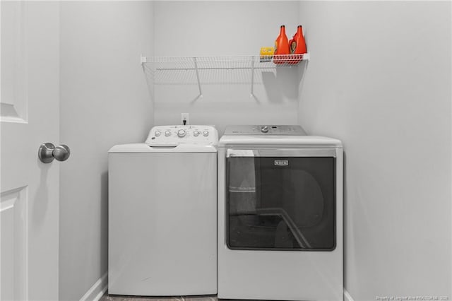 washroom with washer and clothes dryer