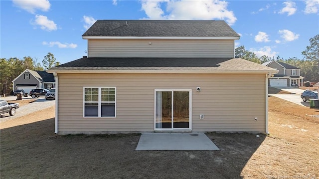 rear view of property with a patio