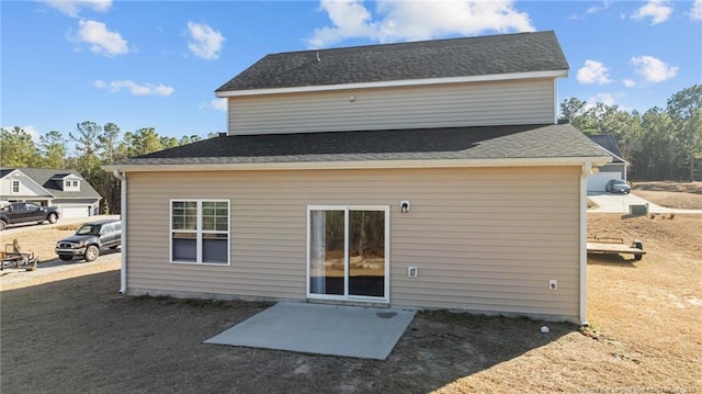 back of house with a patio area