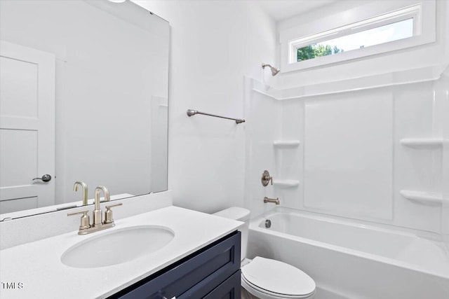 full bathroom featuring shower / washtub combination, toilet, and vanity