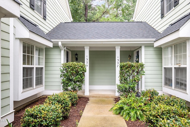 property entrance featuring a porch