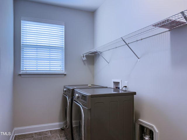 washroom with separate washer and dryer