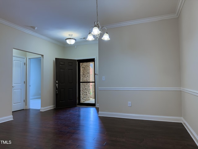 entryway with crown molding, a notable chandelier, and dark hardwood / wood-style flooring