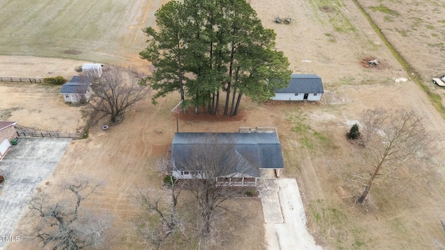 birds eye view of property featuring a rural view