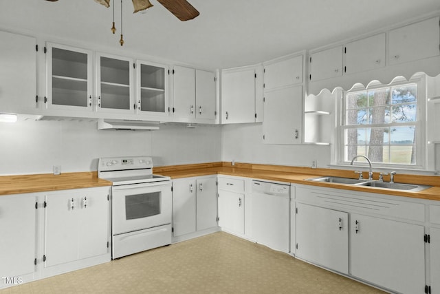 kitchen with white cabinetry, sink, white appliances, and ceiling fan