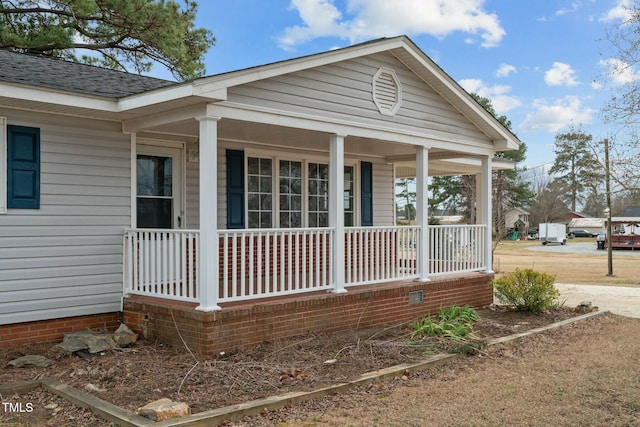 exterior space featuring covered porch