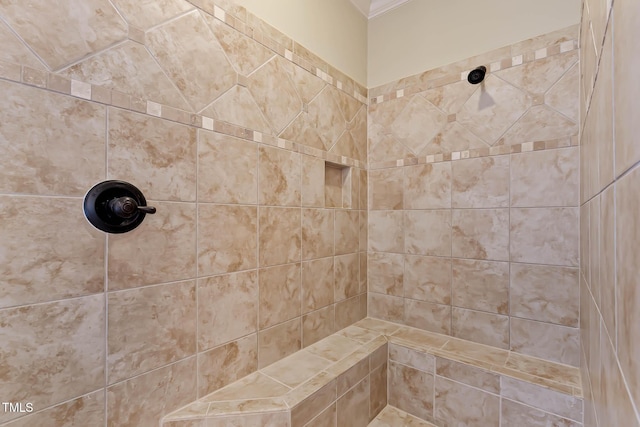 bathroom with tiled shower