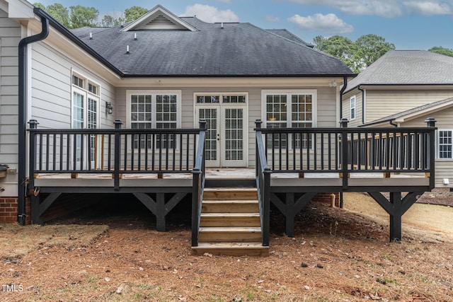 back of property featuring a wooden deck