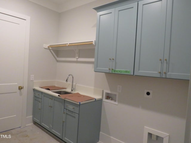 laundry room featuring cabinets, washer hookup, sink, and hookup for an electric dryer