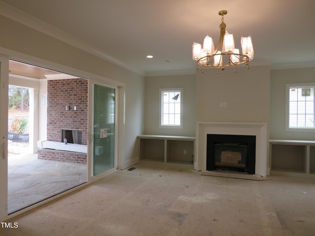 unfurnished living room with a notable chandelier and ornamental molding