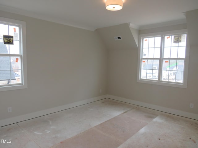 additional living space with visible vents and baseboards