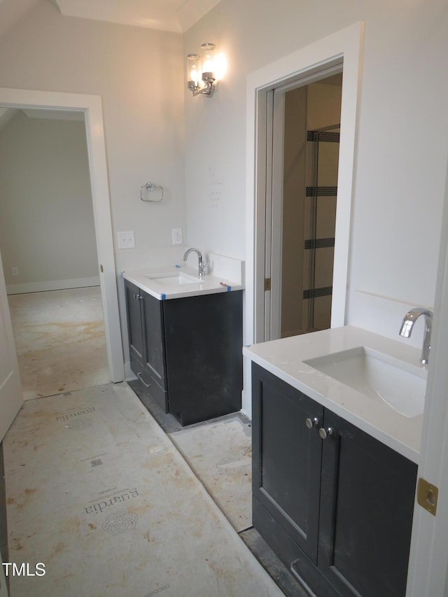 bathroom featuring vanity and walk in shower