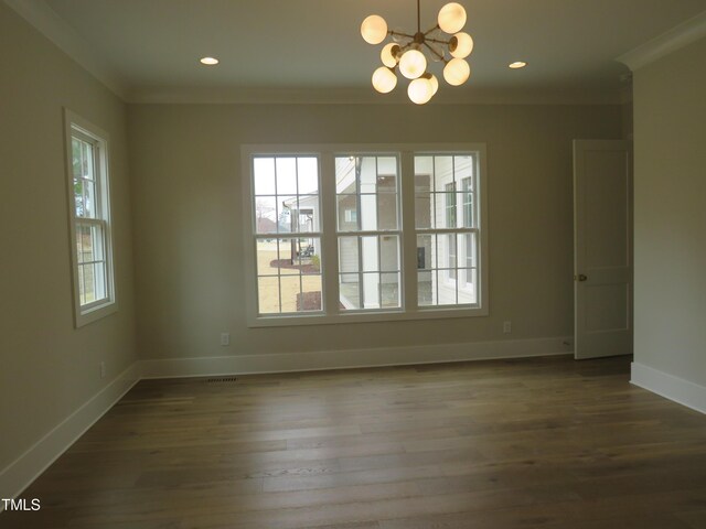 unfurnished dining area with dark wood-style floors, a notable chandelier, baseboards, and ornamental molding