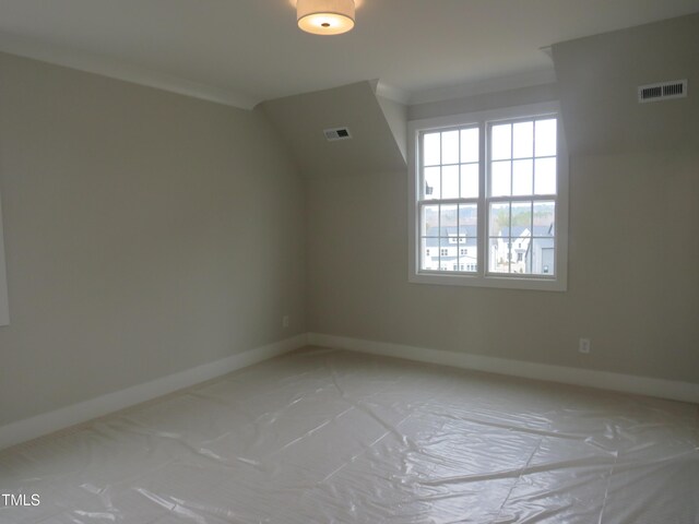 bonus room with visible vents and baseboards