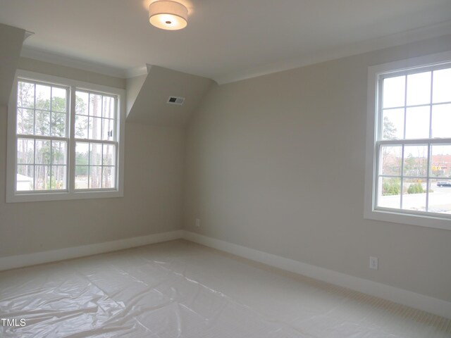 bonus room with visible vents and baseboards