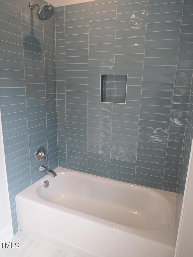 bathroom featuring shower / bathtub combination
