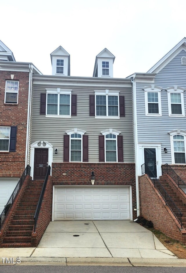 view of property featuring a garage