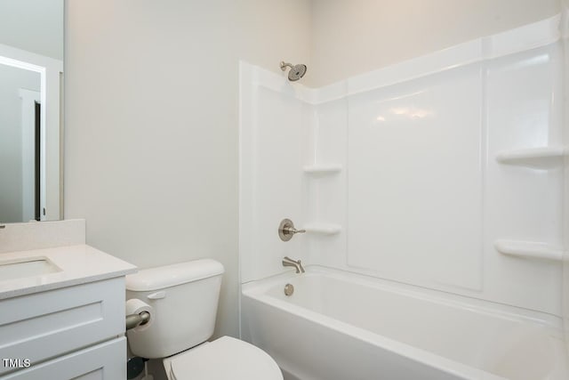 full bathroom with vanity, washtub / shower combination, and toilet