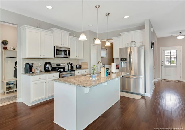 kitchen with white cabinetry, sink, and appliances with stainless steel finishes