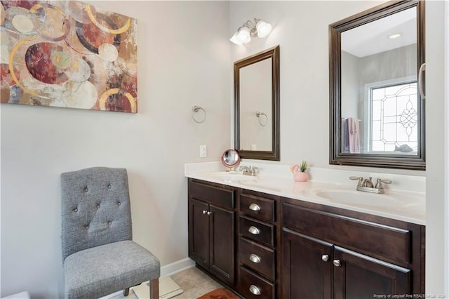 bathroom with vanity and tile patterned flooring