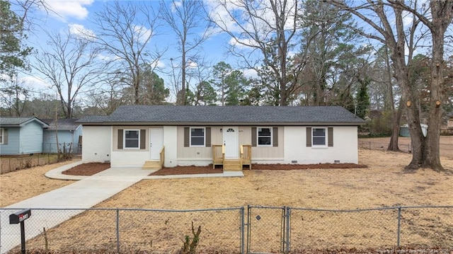 ranch-style house featuring crawl space, a fenced front yard, and a gate