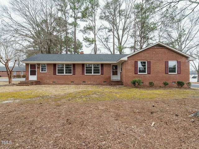 ranch-style house featuring a front yard