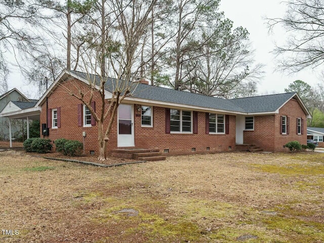 ranch-style home with a front lawn