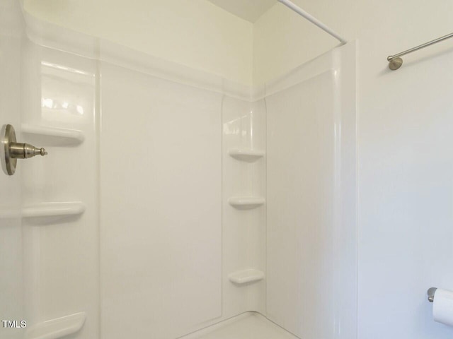 bathroom with walk in shower