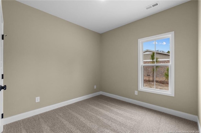 view of carpeted spare room