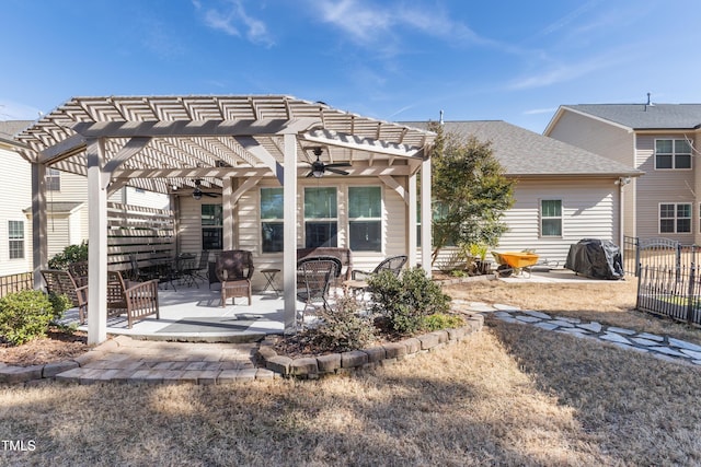 back of house with a pergola, a patio area, and ceiling fan