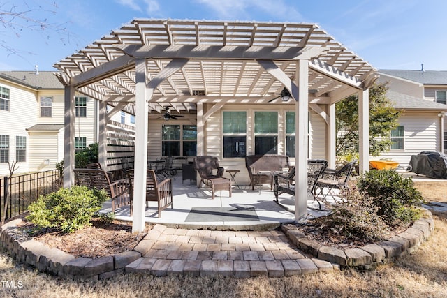 view of patio with ceiling fan, grilling area, and a pergola