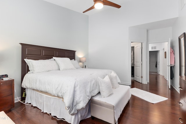 bedroom with ceiling fan and dark hardwood / wood-style floors