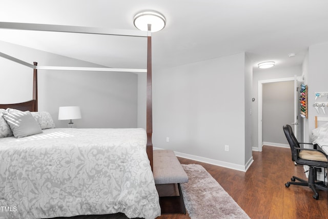 bedroom featuring dark wood-type flooring