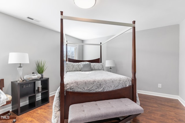 bedroom featuring wood-type flooring