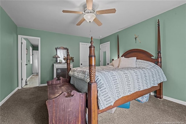 bedroom featuring ensuite bath, light colored carpet, and ceiling fan