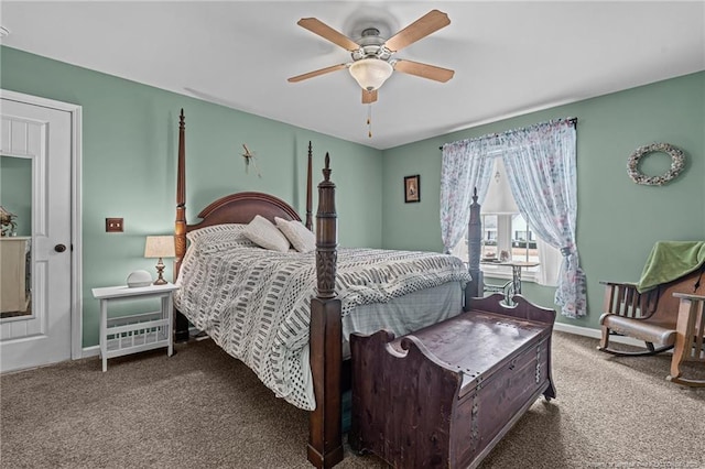 bedroom featuring ceiling fan and carpet