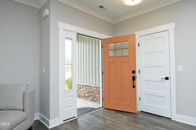 entryway with crown molding and dark hardwood / wood-style floors