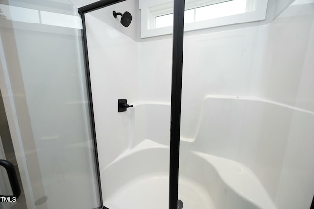 bathroom with an enclosed shower