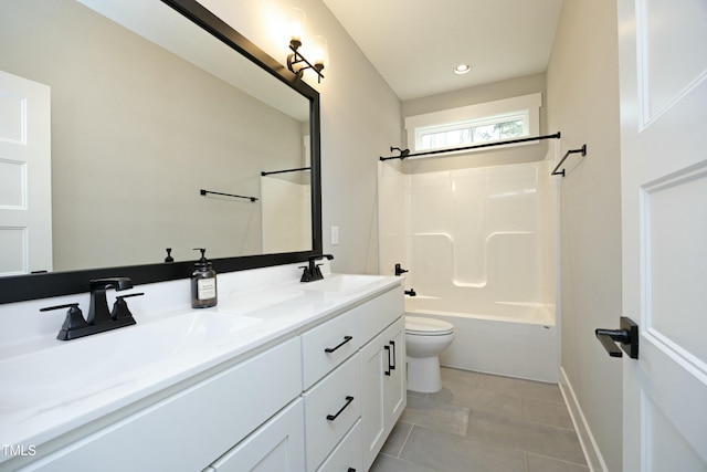 full bathroom with shower / washtub combination, vanity, tile patterned floors, and toilet