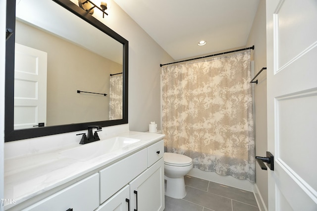 full bathroom featuring tile patterned flooring, vanity, shower / tub combo, and toilet