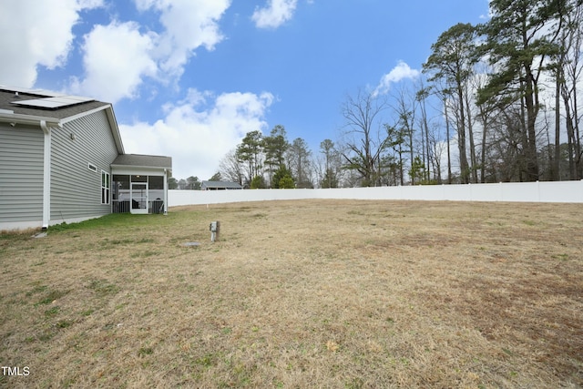 view of yard featuring a sunroom