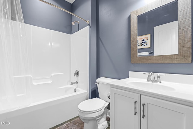 full bathroom featuring washtub / shower combination, vanity, toilet, and tile patterned floors