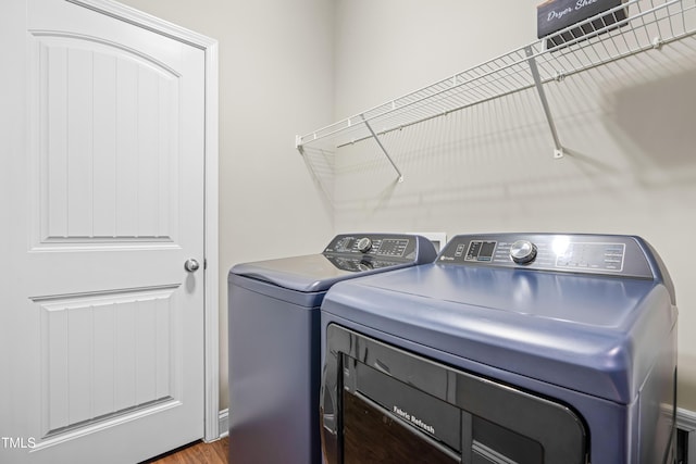 laundry area featuring laundry area and washer and clothes dryer