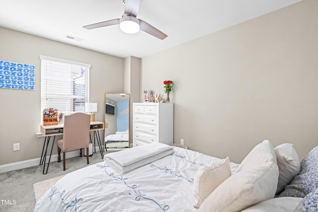 bedroom with a ceiling fan, baseboards, visible vents, and carpet flooring