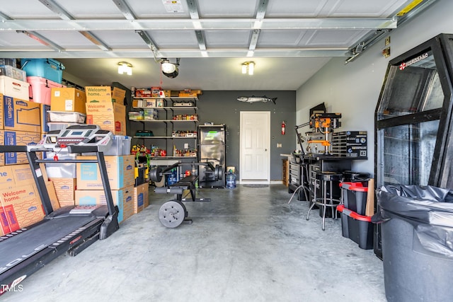 garage featuring a garage door opener