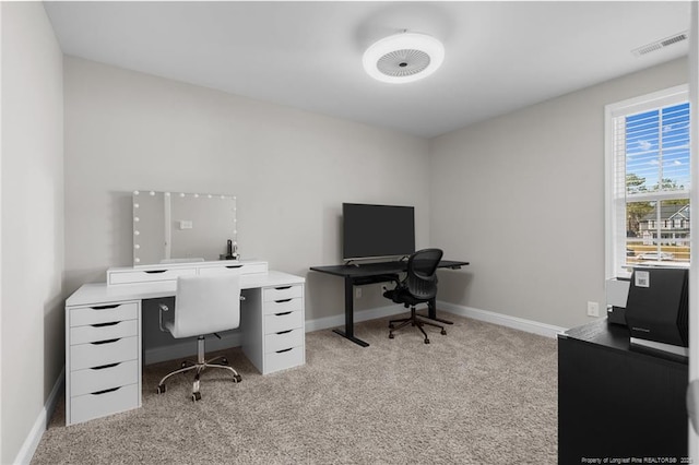 home office with light carpet