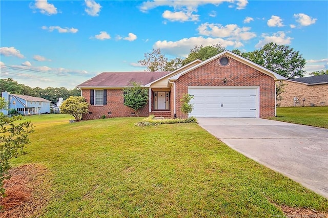 ranch-style house featuring a garage and a front lawn