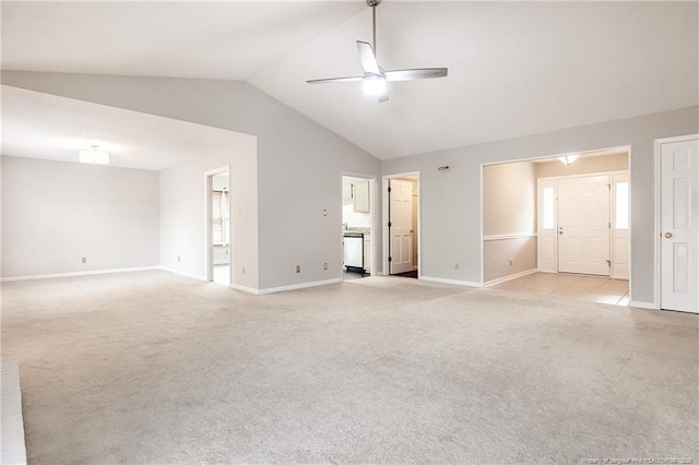 interior space with ceiling fan and vaulted ceiling